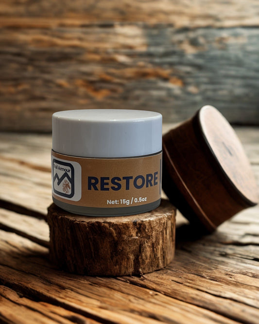 Trail Armour RESTORE overnight lip treatment, 15g jar on weathered timber