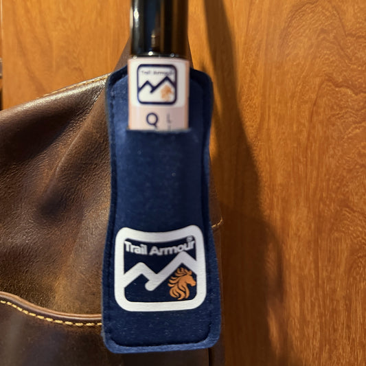 Close up of a Trail Armour QUENCH roller in a navy neoprene lip balm holder